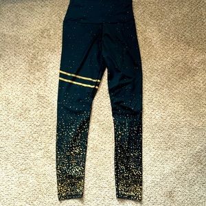 NWOT Medium Black and gold yoga pants